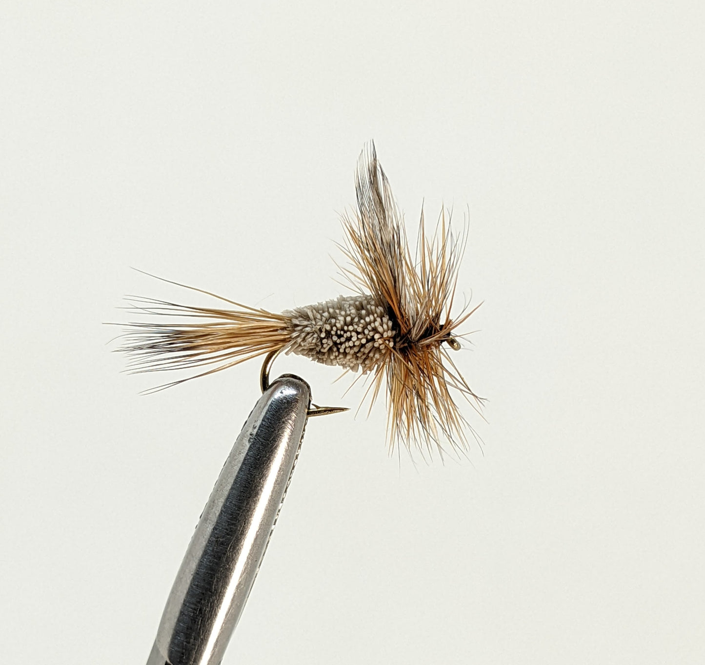 Adams Irresistable Fly fishing fly. Dry, subsurface and nymph flies for anglers and fisherman. All the flies you need for sale online. Flies to buy online. Online fly fishing supplies. Catch fish with flies from Frontier Flies.