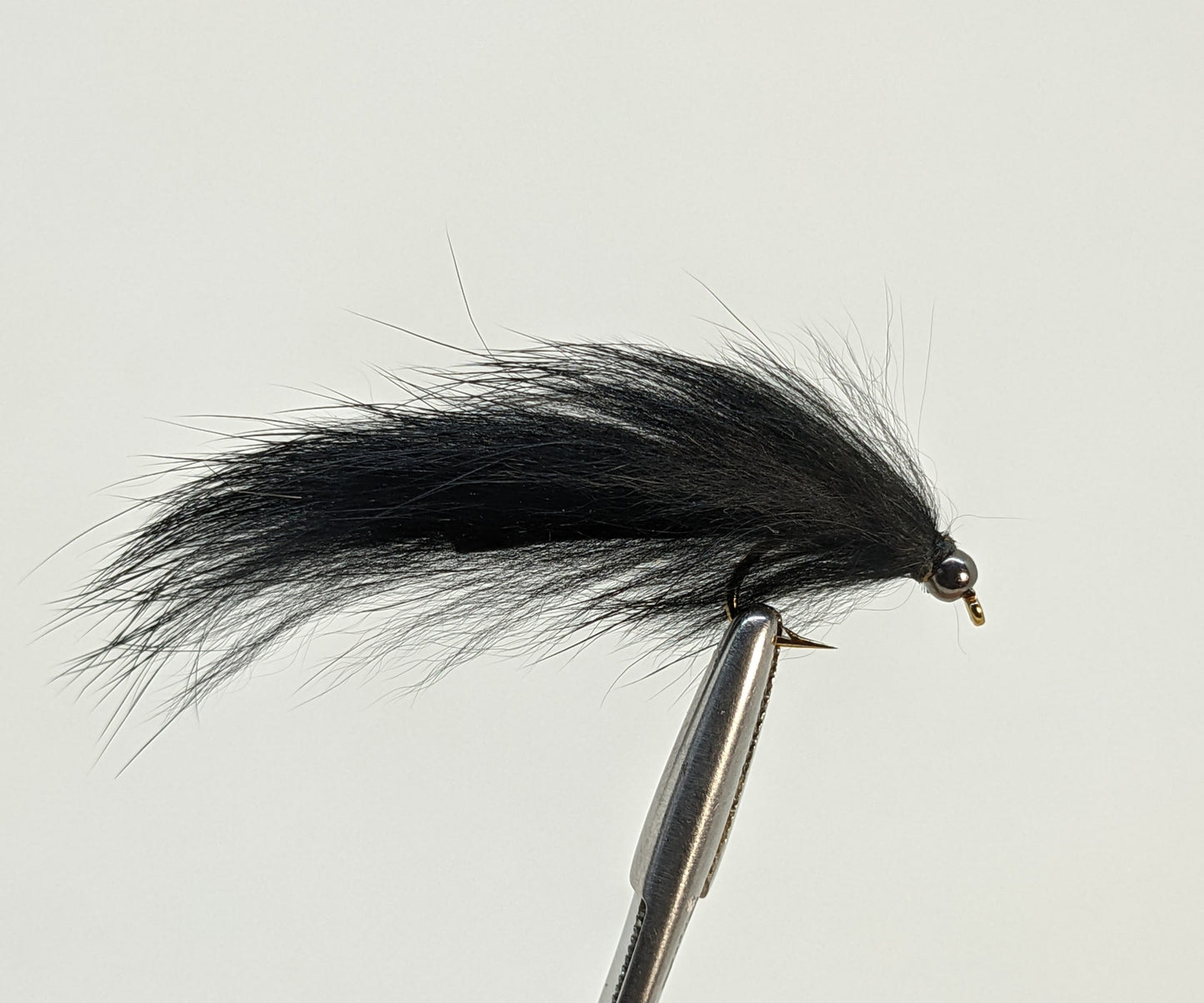Black Bunny Leech Bead Head Fly fishing fly. Dry, subsurface and nymph flies for anglers and fisherman. All the flies you need for sale online. Flies to buy online. Online fly fishing supplies. Catch fish with flies from Frontier Flies.