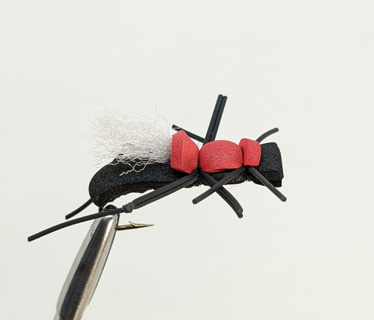 Fat Albert Black Fly fishing fly. Dry, subsurface and nymph flies for anglers and fisherman. All the flies you need for sale online. Flies to buy online. Online fly fishing supplies. Catch fish with flies from Frontier Flies.