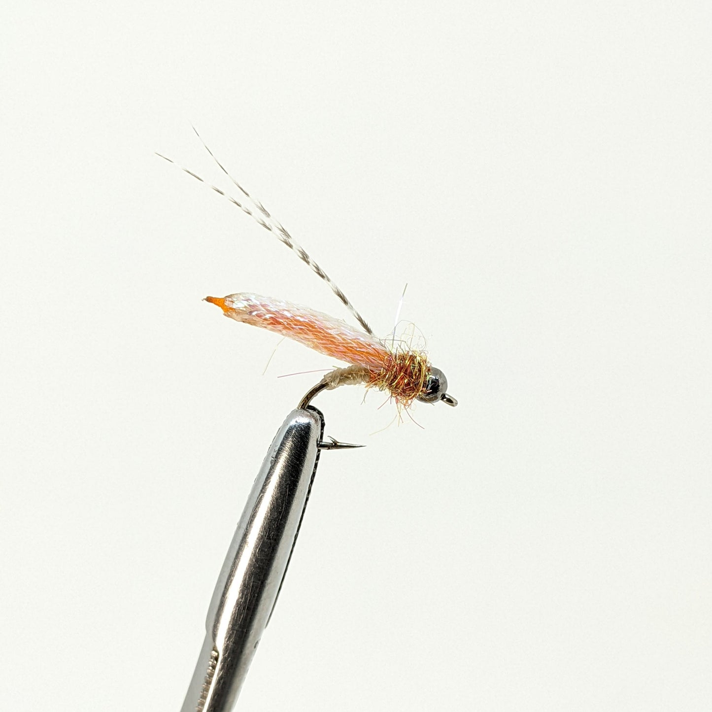 Fox Pupa Bead Head Flash Fly fishing fly. Dry, subsurface and nymph flies for anglers and fisherman. All the flies you need for sale online. Flies to buy online. Online fly fishing supplies. Catch fish with flies from Frontier Flies.