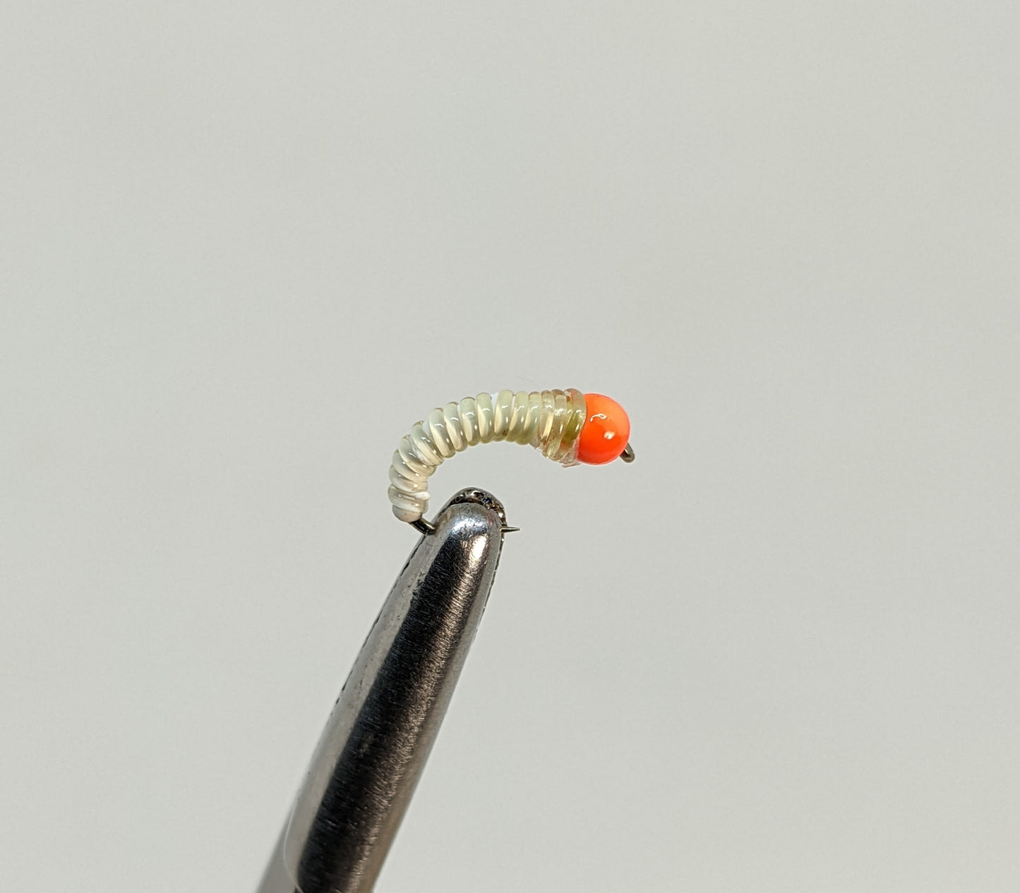 Grub Bead Head White Fly fishing fly. Dry, subsurface and nymph flies for anglers and fisherman. All the flies you need for sale online. Flies to buy online. Online fly fishing supplies. Catch fish with flies from Frontier Flies.