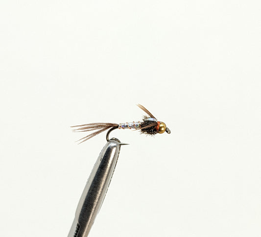 Lightning Bug Bead Head Silver Fly fishing fly. Dry, subsurface and nymph flies for anglers and fisherman. All the flies you need for sale online. Flies to buy online. Online fly fishing supplies. Catch fish with flies from Frontier Flies.