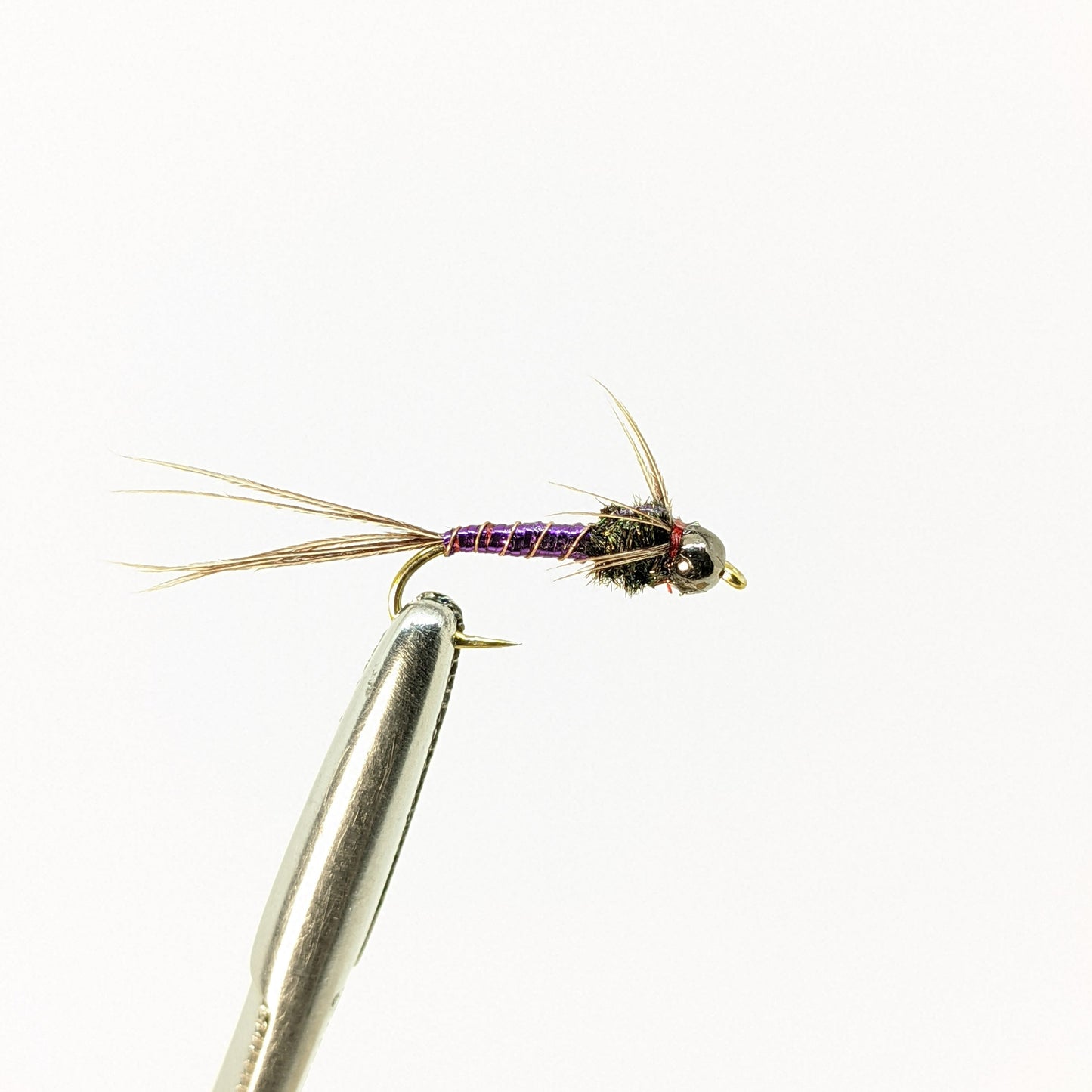 Lightning Bug Bead Head Purple Fly fishing fly. Dry, subsurface and nymph flies for anglers and fisherman. All the flies you need for sale online. Flies to buy online. Online fly fishing supplies. Catch fish with flies from Frontier Flies.