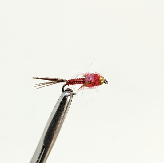 Nymphomaniac Red Fly fishing fly. Dry, subsurface and nymph flies for anglers and fisherman. All the flies you need for sale online. Flies to buy online. Online fly fishing supplies. Catch fish with flies from Frontier Flies.