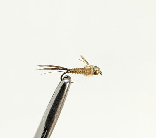 Nymphomaniac Bead Head Tan Fly fishing fly. Dry, subsurface and nymph flies for anglers and fisherman. All the flies you need for sale online. Flies to buy online. Online fly fishing supplies. Catch fish with flies from Frontier Flies.