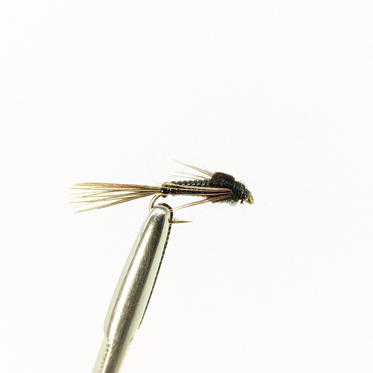 Nymphomaniac Black Fly fishing fly. Dry, subsurface and nymph flies for anglers and fisherman. All the flies you need for sale online. Flies to buy online. Online fly fishing supplies. Catch fish with flies from Frontier Flies.