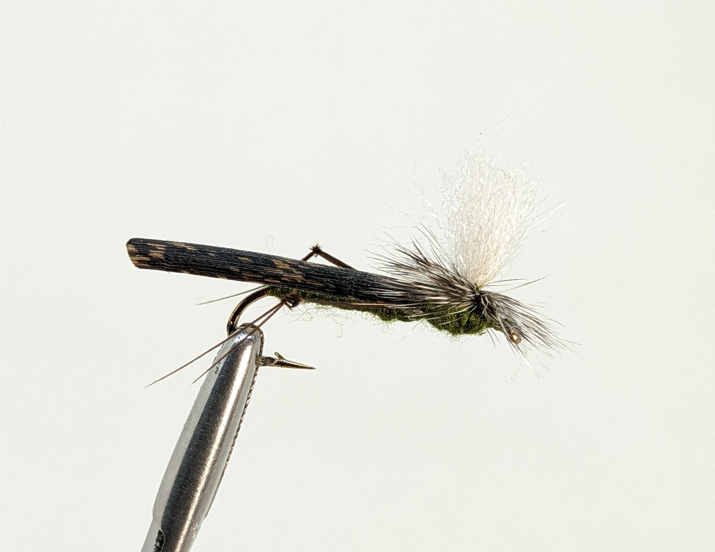 Parachute Hopper Olive Fly fishing fly. Dry, subsurface and nymph flies for anglers and fisherman. All the flies you need for sale online. Flies to buy online. Online fly fishing supplies. Catch fish with flies from Frontier Flies.