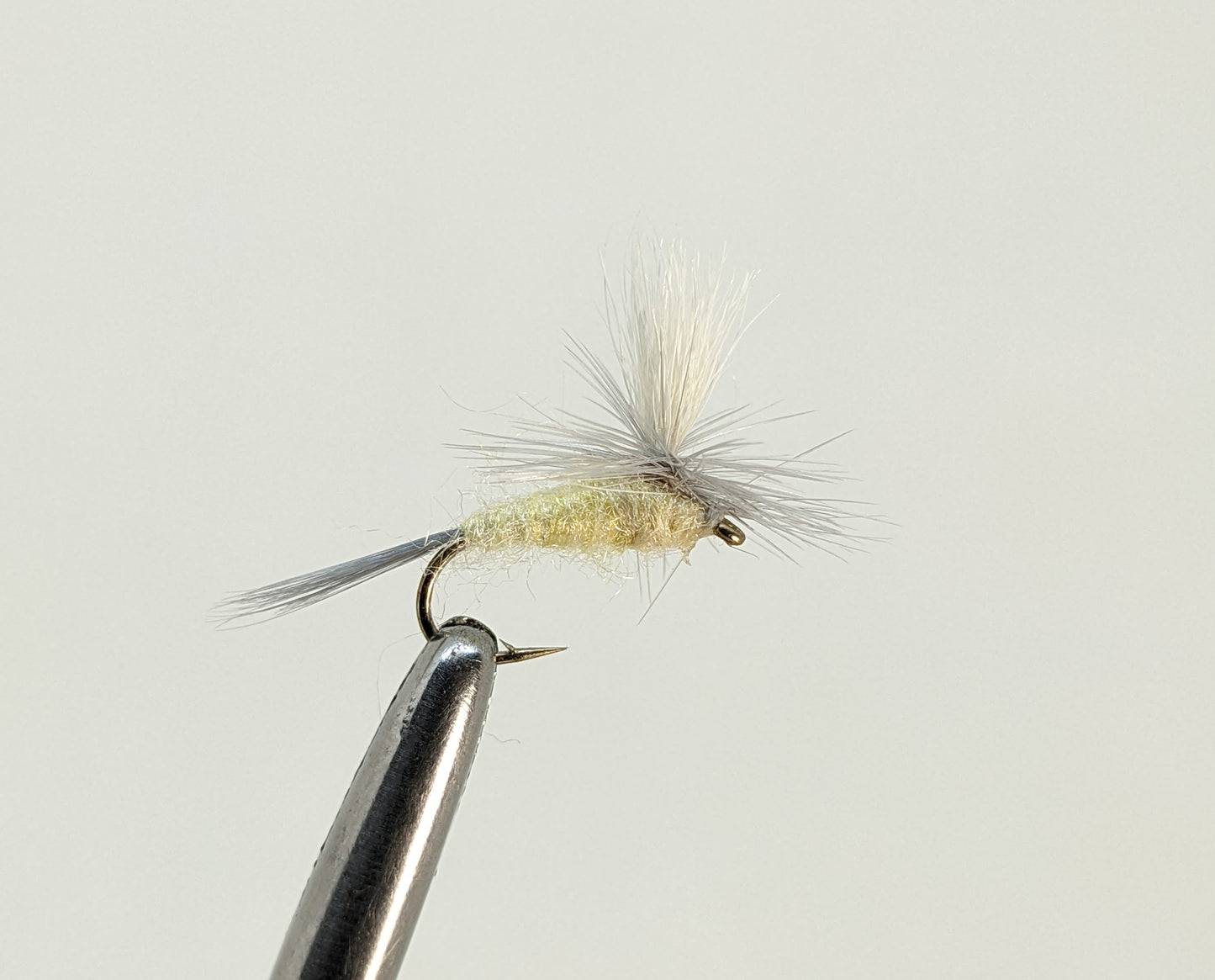 Pale Morning Dun PMD Parachute Fly fishing fly. Dry, subsurface and nymph flies for anglers and fisherman. All the flies you need for sale online. Flies to buy online. Online fly fishing supplies. Catch fish with flies from Frontier Flies.