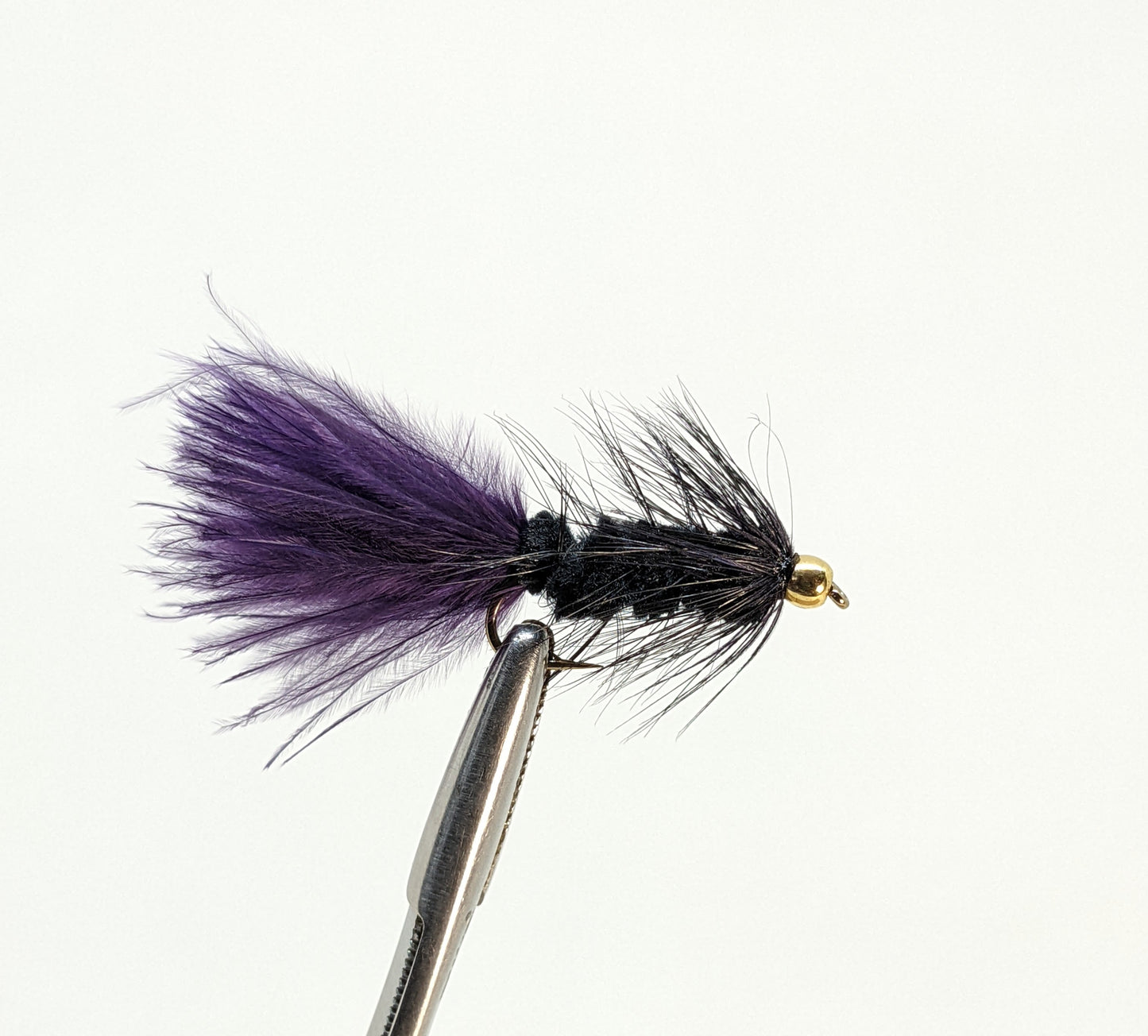 Woolly Bugger Bead Head Black Purple Fly fishing fly. Dry, subsurface and nymph flies for anglers and fisherman. All the flies you need for sale online. Flies to buy online. Online fly fishing supplies. Catch fish with flies from Frontier Flies.